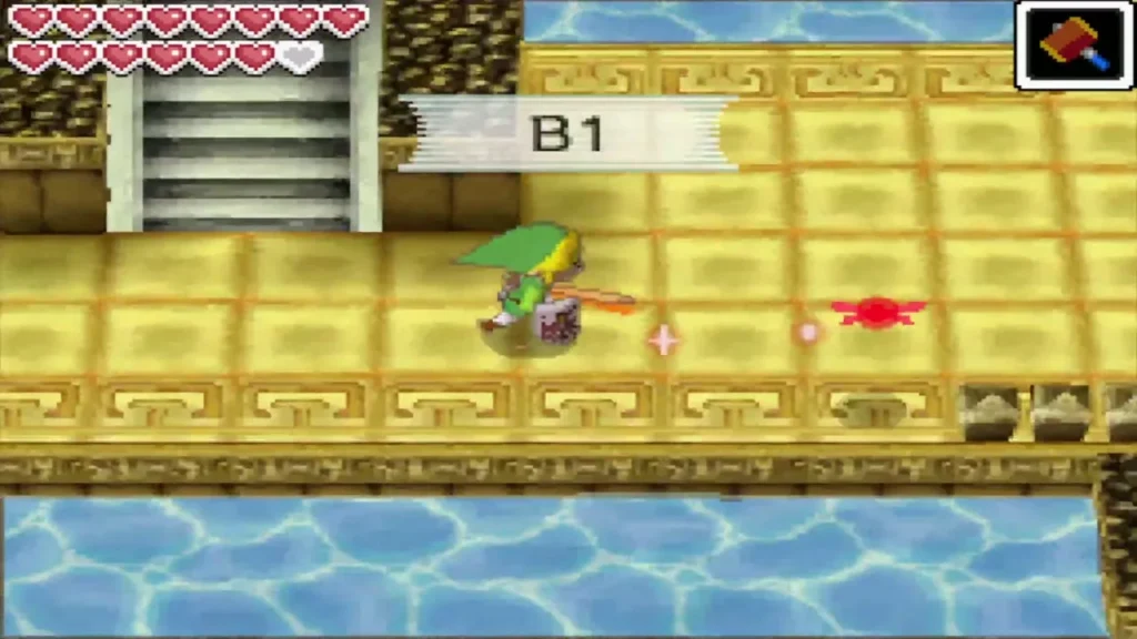 Link on a golden walkway on B1 beside the stairs and water Link on a golden walkway on B1 beside the stairs and water