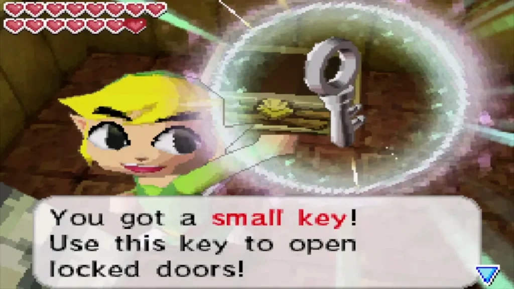 Link holding up the second small key with the full item message Link holding up the second small key with the full item message
