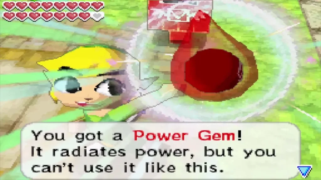 Link holding up a Power Gem beside the red mailbox with the message that he got it