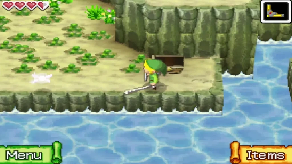 Link beside the chest on the grassy ledge by the channel on Spirit Island