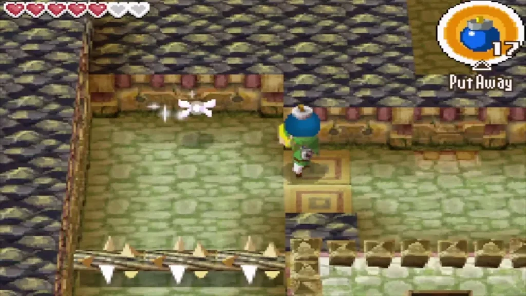 Link carrying a bomb along a spiked-bar passage Link carrying a bomb along a spiked-bar passage
