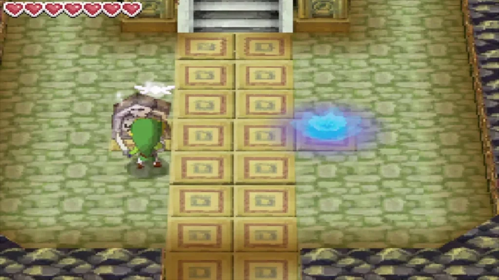 Link standing by the blue warp glowing on the floor of 3F Link standing by the blue warp glowing on the floor of 3F