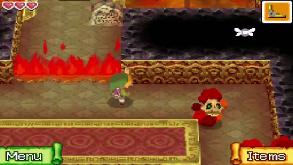 Link facing a red Bubble beside a row of flames Link facing a red Bubble beside a row of flames