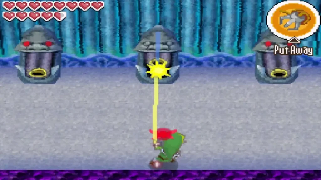 Link grappling the tongue of the middle statue in a row of three on 1F Link grappling the tongue of the middle statue in a row of three on 1F