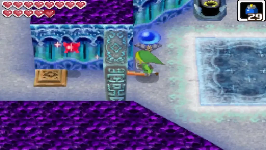 Link swinging his sword at a blue crystal switch next to a stone pillar Link swinging his sword at a blue crystal switch next to a stone pillar