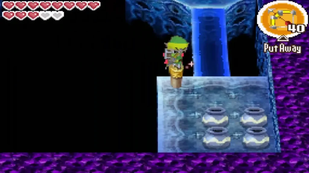 Link standing on the wooden peg aiming his bow at a crystal switch Link standing on the wooden peg aiming his bow at a crystal switch
