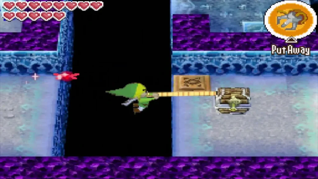 Link grappling a chest across a gap on B1 to pull himself over Link grappling a chest across a gap on B1 to pull himself over