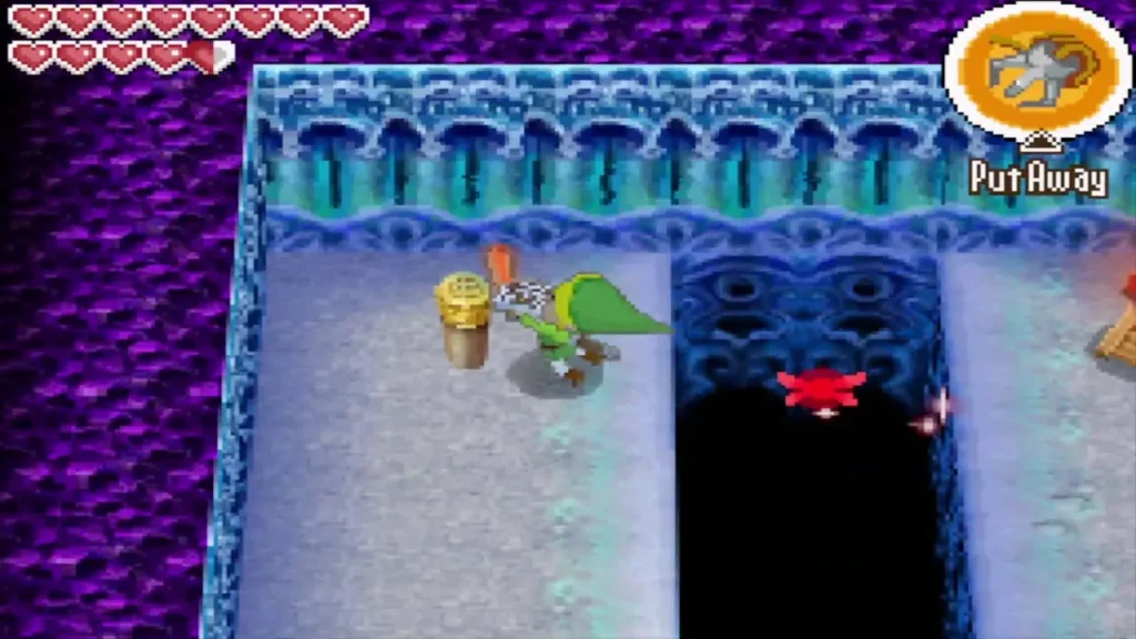 Link grappling the wooden peg on the west side of the floor Link grappling the wooden peg on the west side of the floor