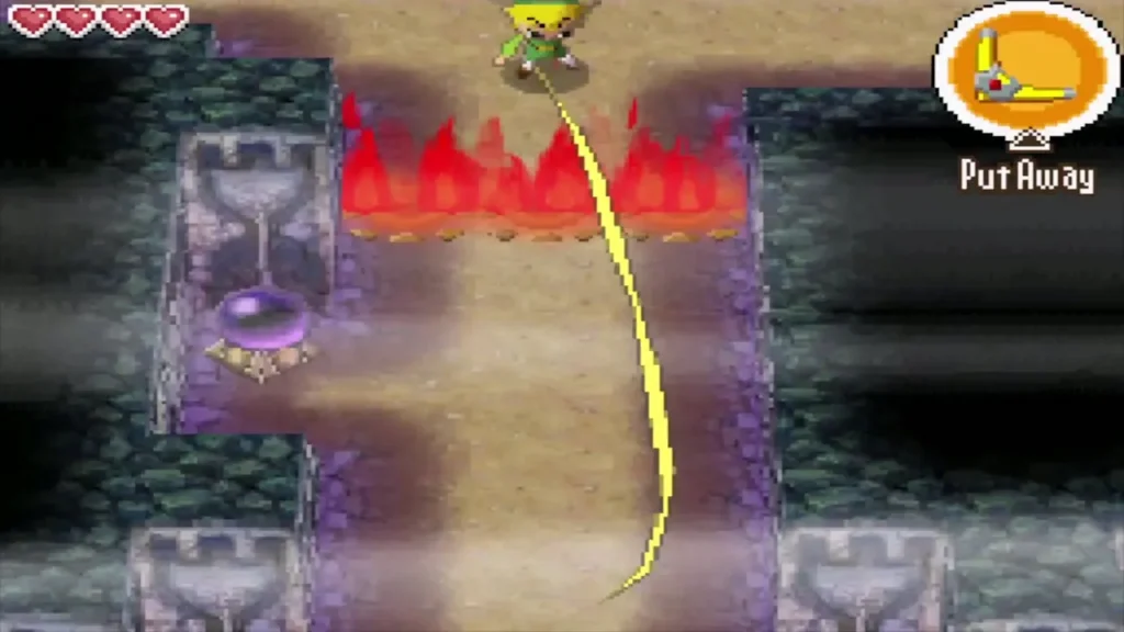 Link throwing the Boomerang past a wall of flames toward a crystal switch Link throwing the Boomerang past a wall of flames toward a crystal switch