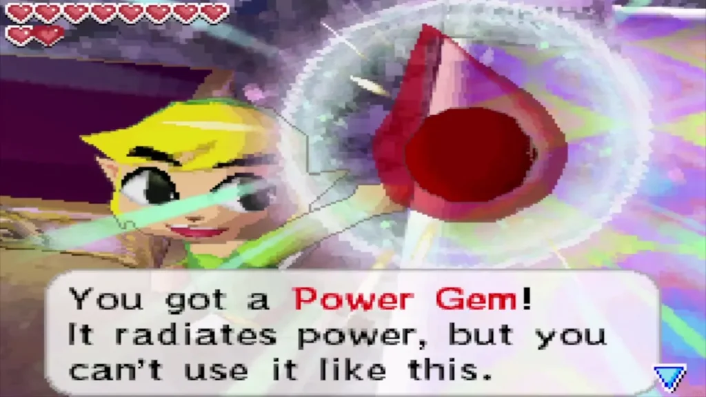 Link holds up the Power Gem with its message box Link holds up the Power Gem with its message box