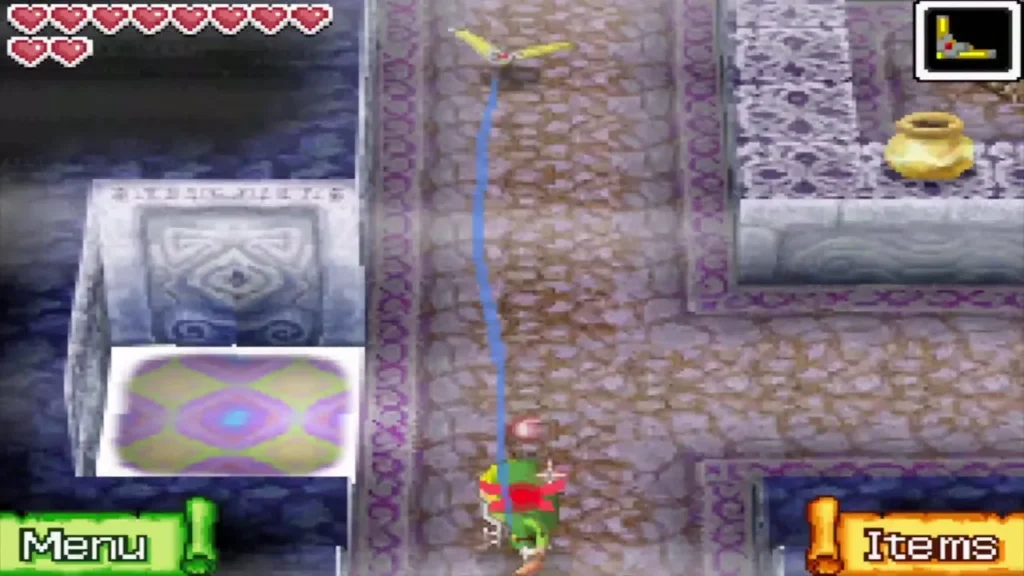 Link aims the Boomerang along a blue path on B4 Link aims the Boomerang along a blue path on B4