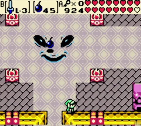 Facade giant face on the castle floor with a bomb set in front of it Facade giant face on the castle floor with a bomb set in front of it