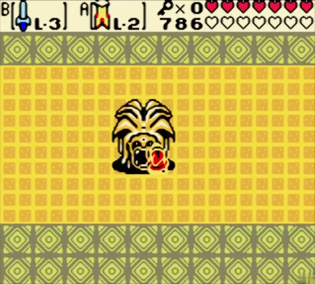 The defeated Medusa-style head boss lying on the yellow floor The defeated Medusa-style head boss lying on the yellow floor