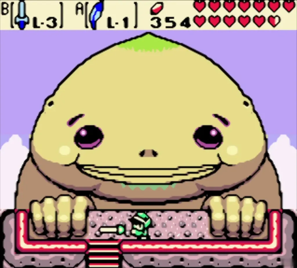 The giant Biggoron with eyes open in his room above tiny Link