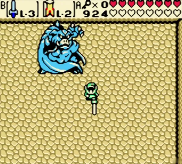 Ganon leaping through the air to strike Link in the yellow-floor room