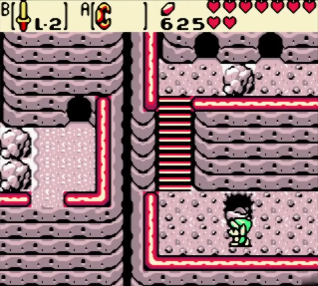 Link climbing the snowy ledges of Goron Mountain past cave doors