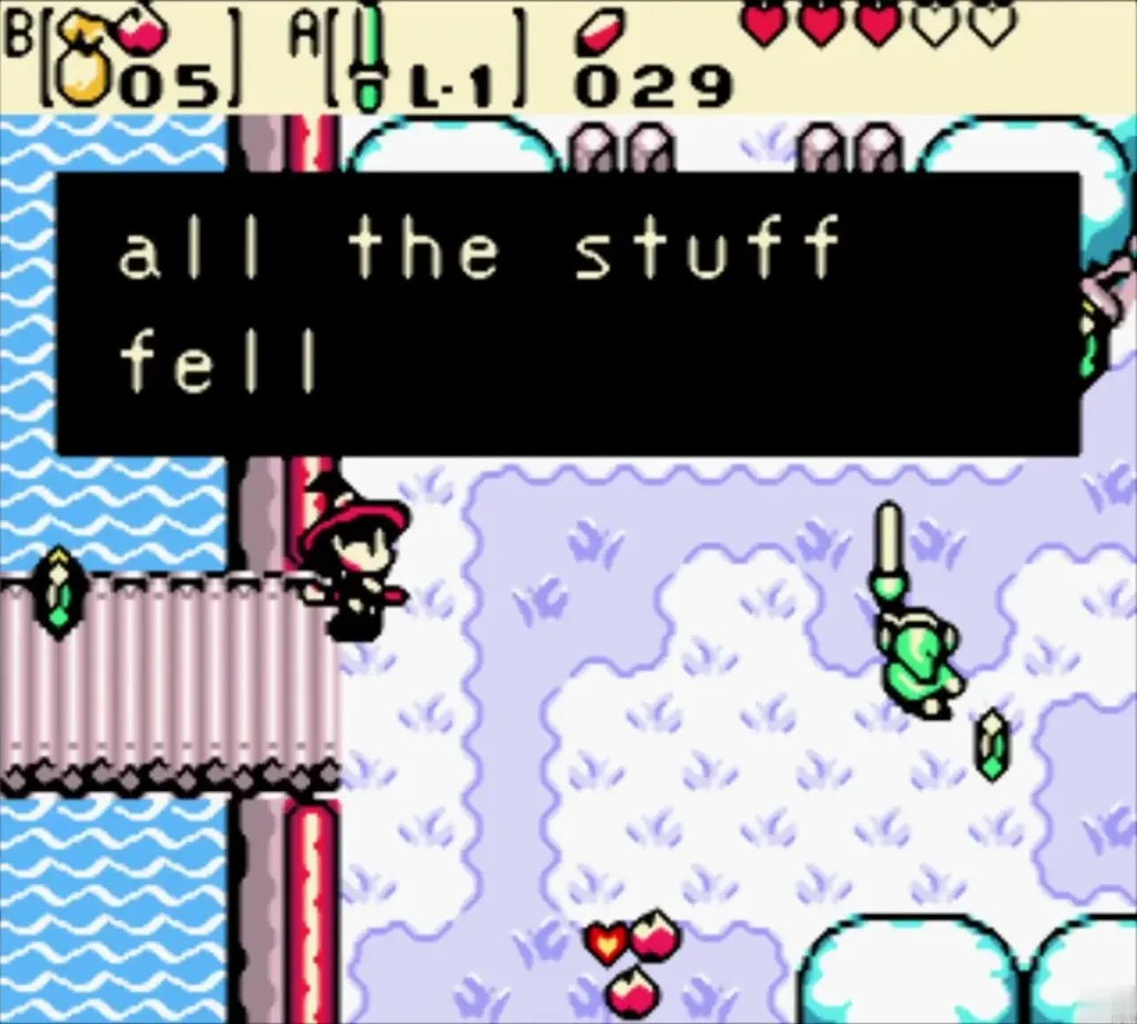 Maple beside Link in the snow with the message all the stuff fell