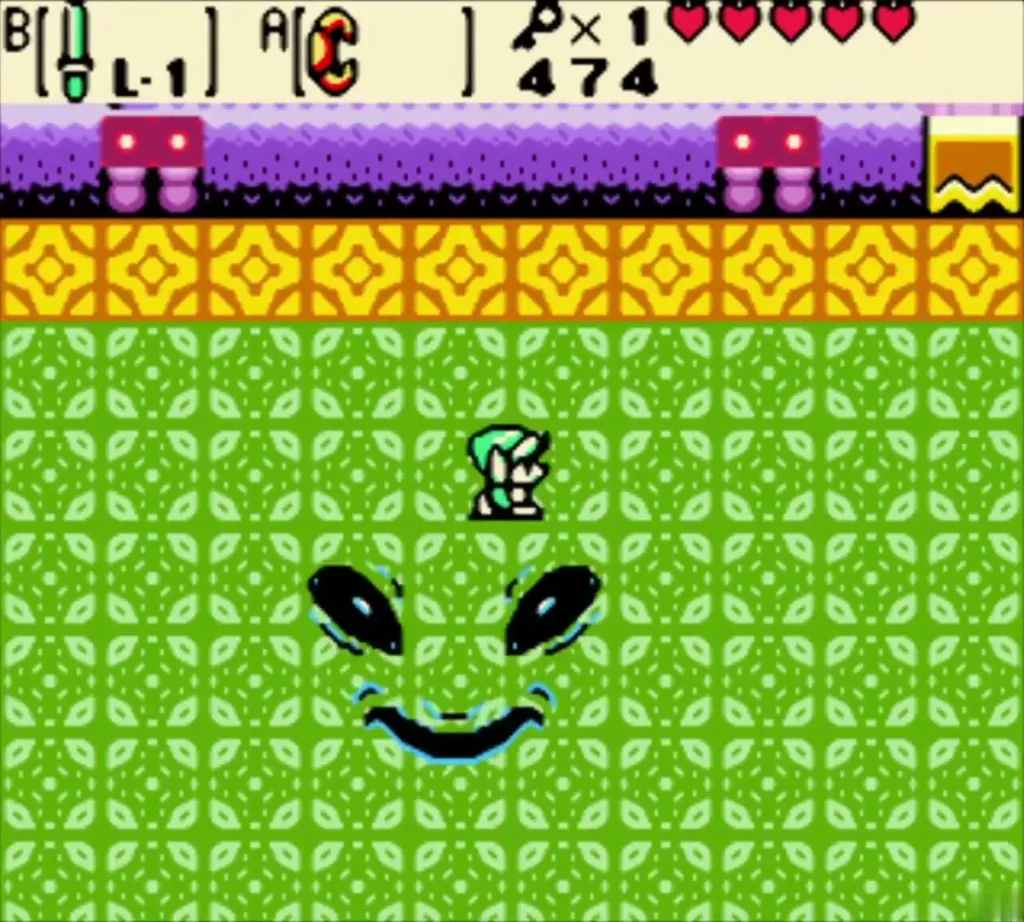 Facade, the large smiling face, in the green room with Link beside it Facade, the large smiling face, in the green room with Link beside it