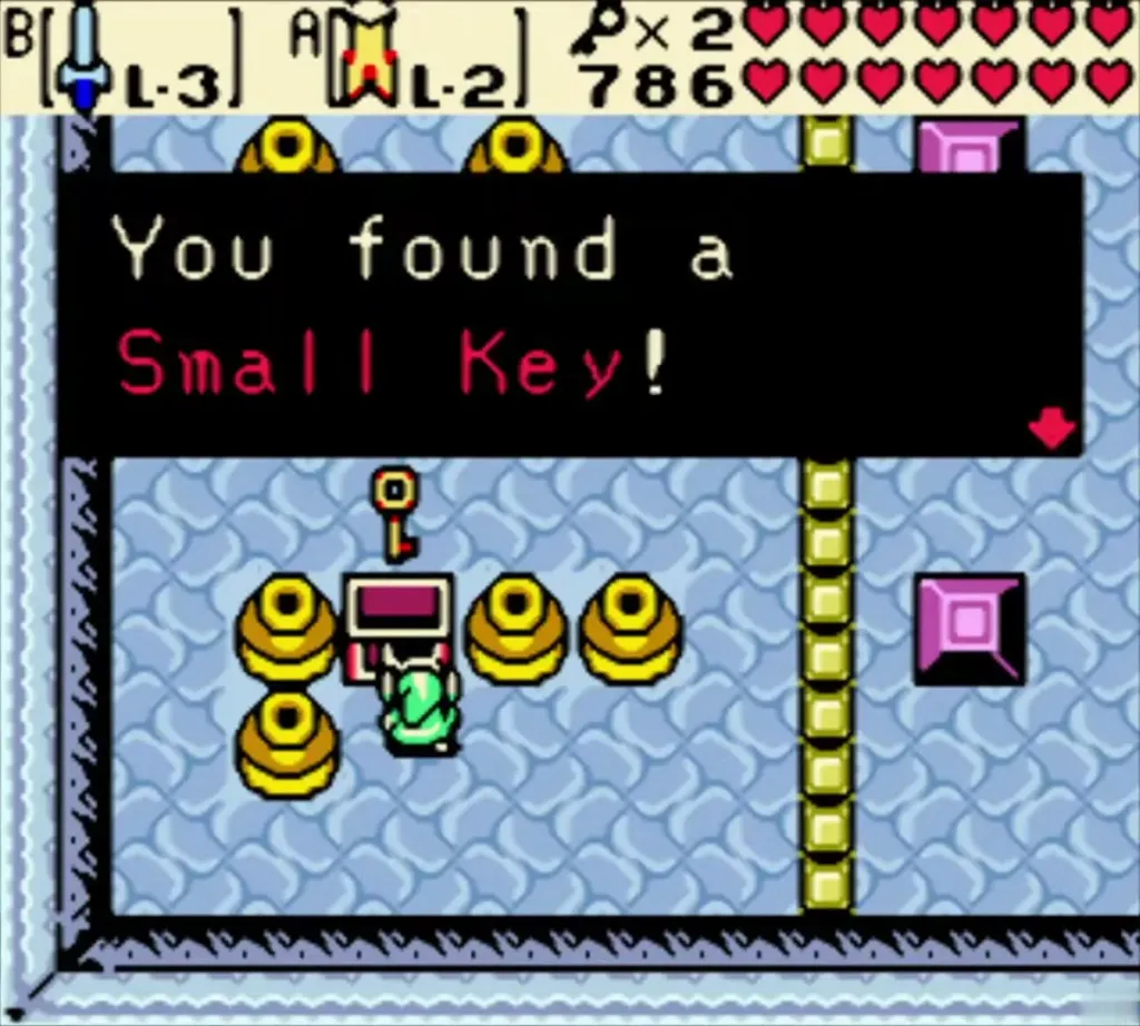 You found a Small Key message box in the gold-disc room of the Sword and Shield Maze You found a Small Key message box in the gold-disc room of the Sword and Shield Maze