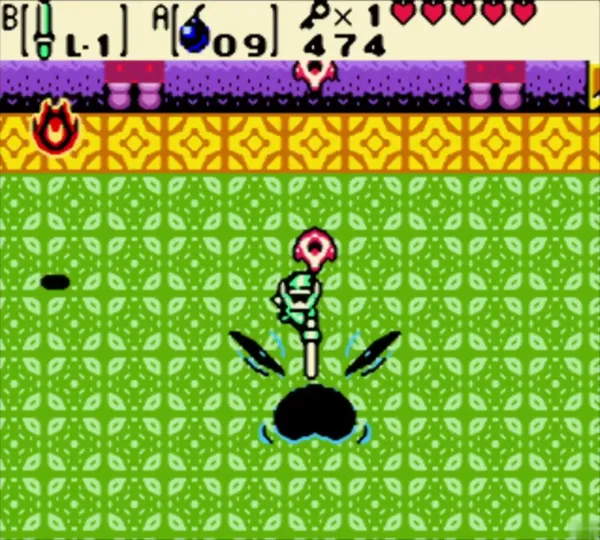 Link on Facade's emerging face while tiles fly around the green mini-boss room Link on Facade's emerging face while tiles fly around the green mini-boss room