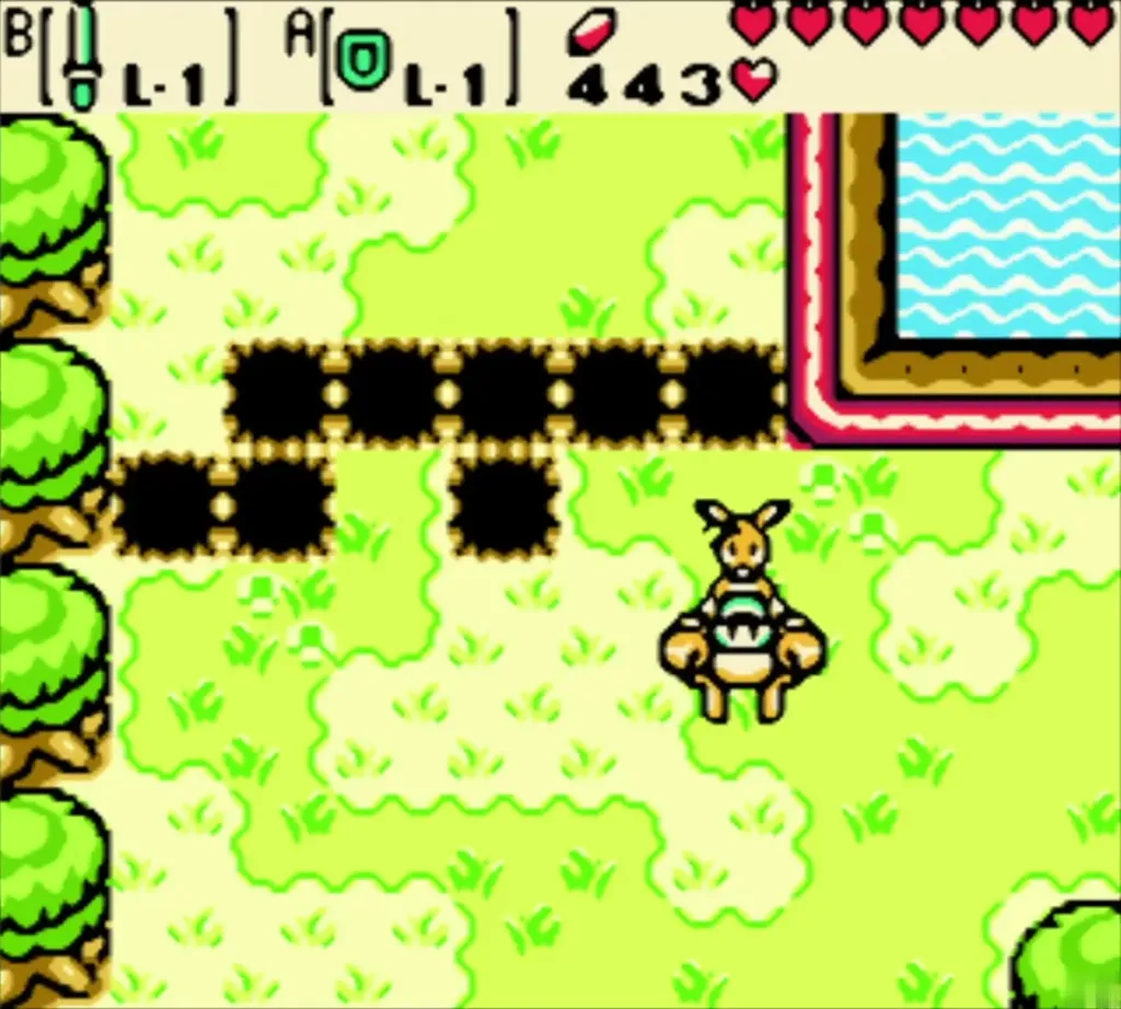 Octorok on the grass of the Spool Swamp shore, with a dark-tiled path and water behind it Octorok on the grass of the Spool Swamp shore, with a dark-tiled path and water behind it