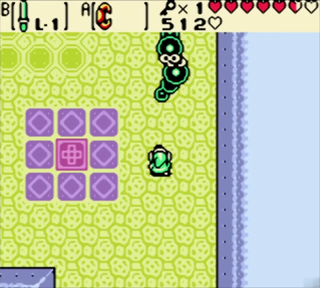 Link facing a Mini-Moldorm on purple tiles in Poison Moth's Lair Link facing a Mini-Moldorm on purple tiles in Poison Moth's Lair