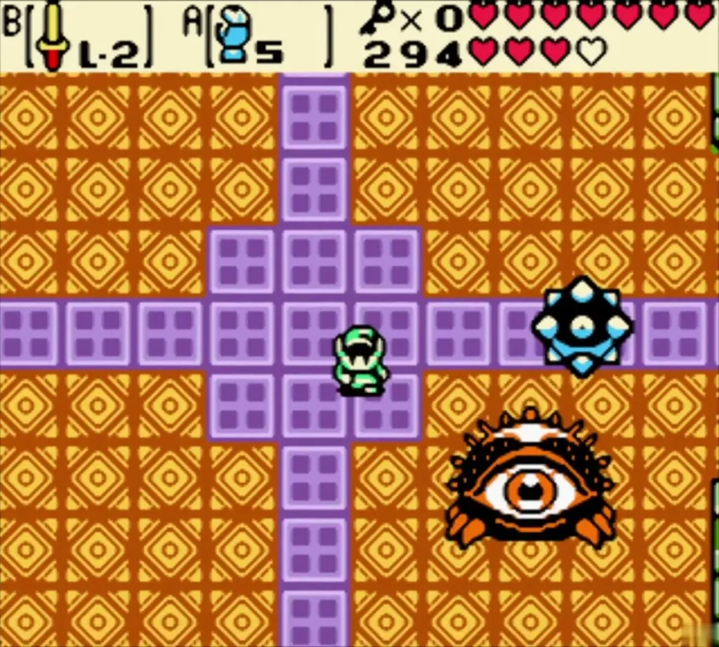 Digdogger, the giant eye urchin, with a spiked blue minion in the Unicorn's Cave boss room Digdogger, the giant eye urchin, with a spiked blue minion in the Unicorn's Cave boss room