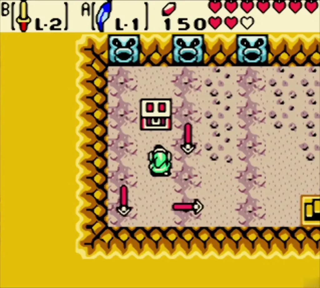 Link in the cave beneath Eyeglass Lake with gold walls and blue statues along the top wall Link in the cave beneath Eyeglass Lake with gold walls and blue statues along the top wall