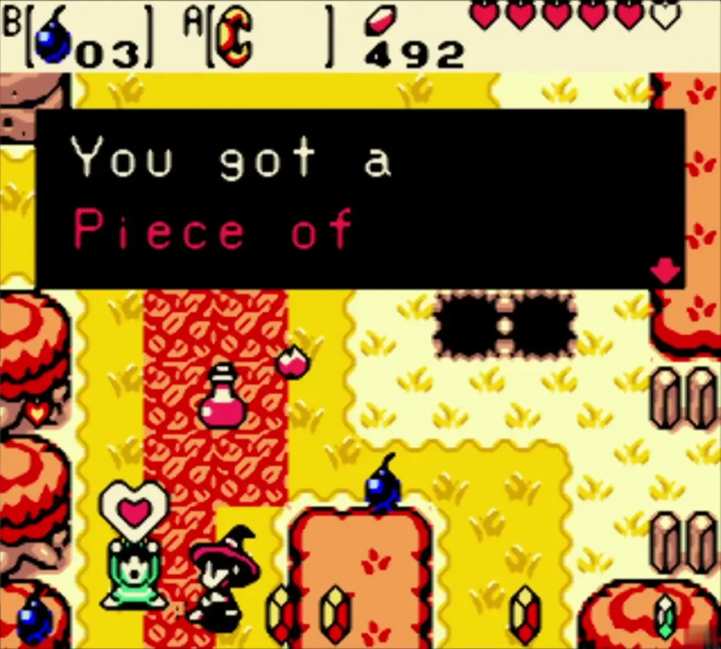 Item-get box reading Piece of Heart! with a heart icon in the yellow field Item-get box reading Piece of Heart! with a heart icon in the yellow field