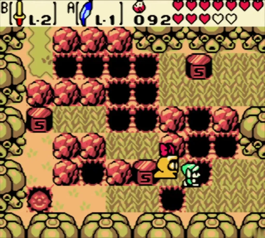 Link among the pits and blocks on the way east toward the Blue Ore chest Link among the pits and blocks on the way east toward the Blue Ore chest