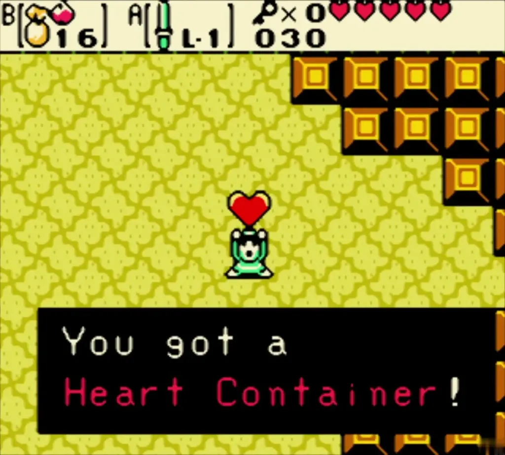 Link holding up the Heart Container with the item message shown Link holding up the Heart Container with the item message shown