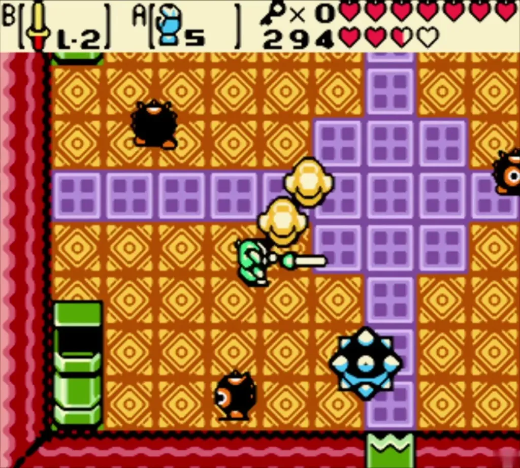 Link with the sword beside small urchins and the spiked ball