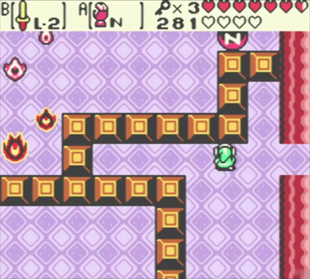 Orange flame creatures beside a row of orange blocks, with Link at the right