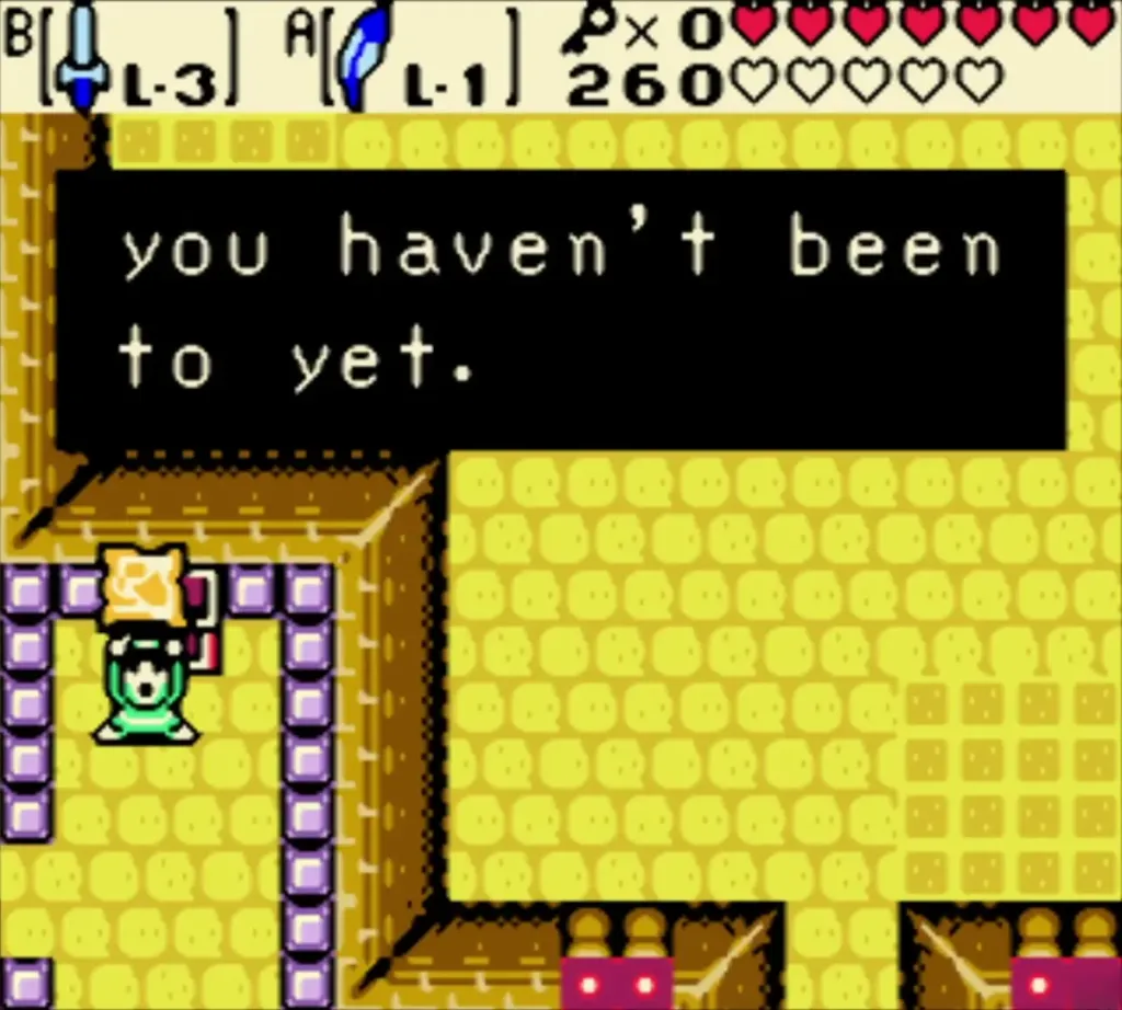 Link holding up the Dungeon Map while the message box explains the Select button Link holding up the Dungeon Map while the message box explains the Select button