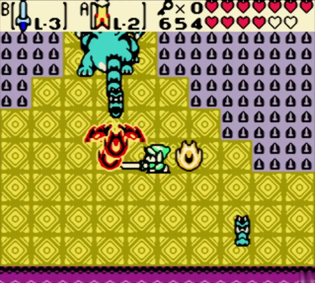 Gleeok's head and a ring of fire as Link slashes with the sword Gleeok's head and a ring of fire as Link slashes with the sword