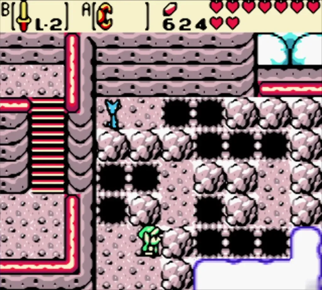 The Dragon Key on a ledge behind rocks and pits in the snow The Dragon Key on a ledge behind rocks and pits in the snow