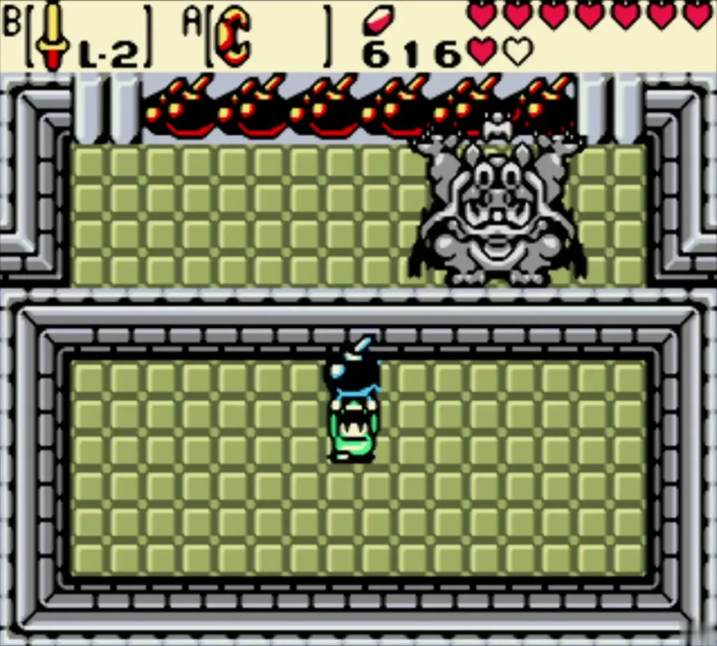 The Great Moblin turned grey with soot as Link holds a bomb The Great Moblin turned grey with soot as Link holds a bomb