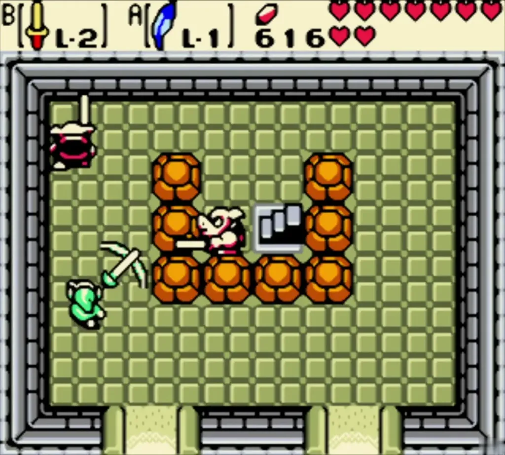 Link fighting a Pig Warrior beside a ring of orange blocks in the stone room Link fighting a Pig Warrior beside a ring of orange blocks in the stone room