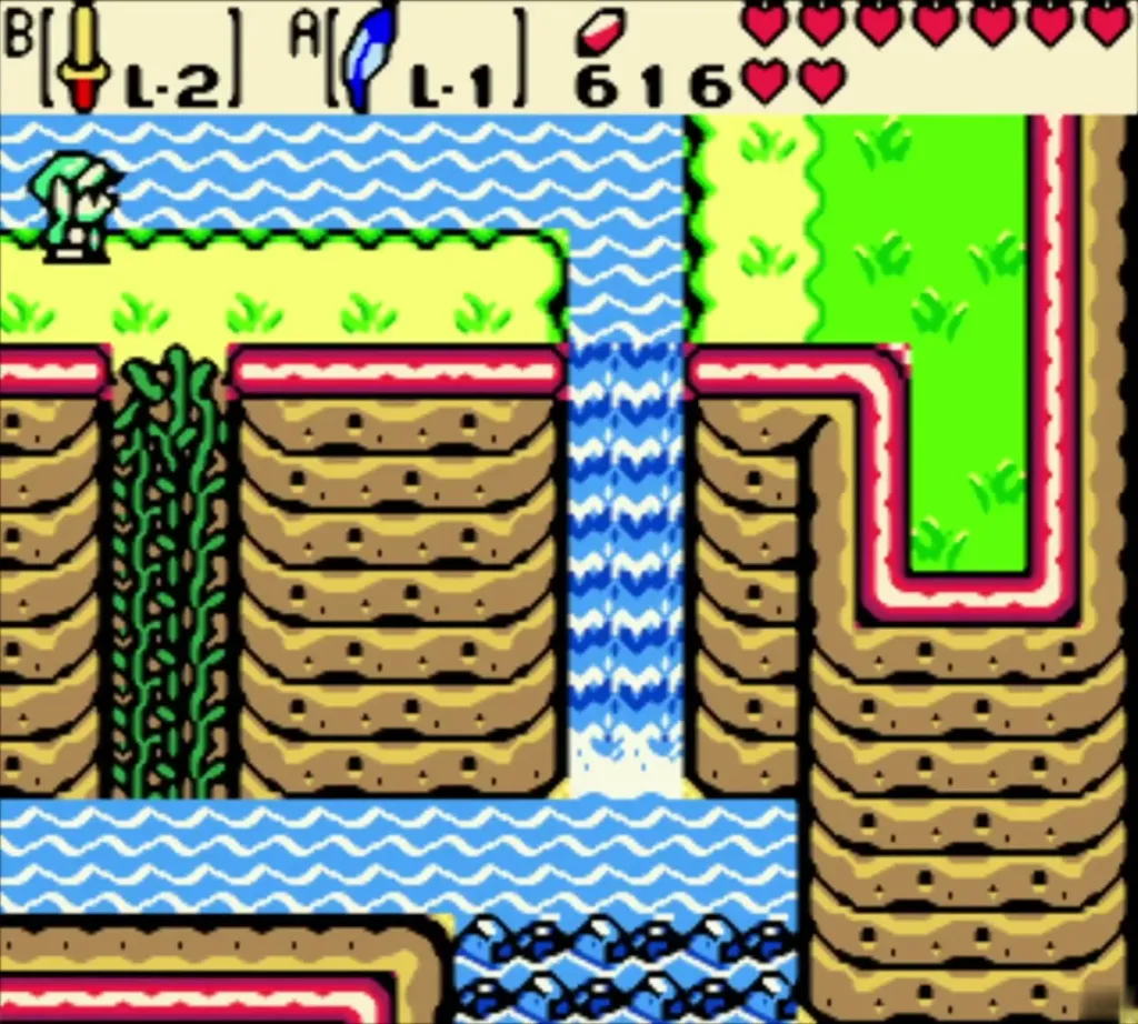 Link reaching the top of the vine cliff beside the waterfall Link reaching the top of the vine cliff beside the waterfall