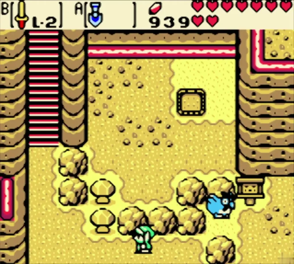 Link walking up through the yellow hills past rocks, with a stair on the left Link walking up through the yellow hills past rocks, with a stair on the left