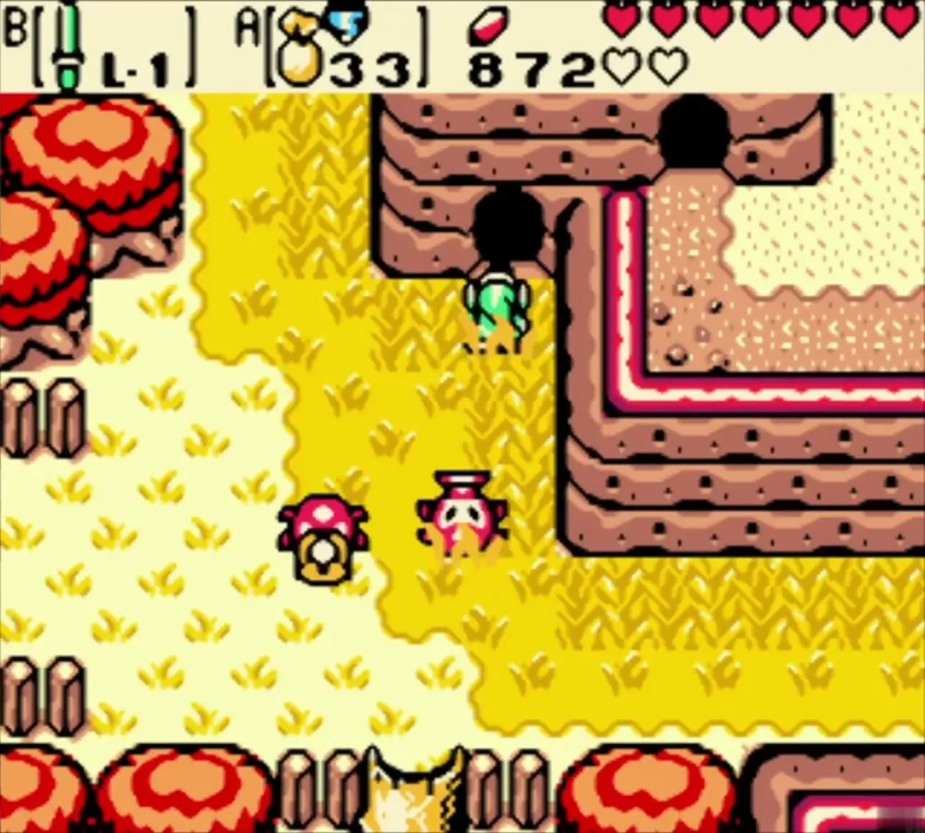 Link near a cave with two red Octoroks among yellow grass and red trees Link near a cave with two red Octoroks among yellow grass and red trees