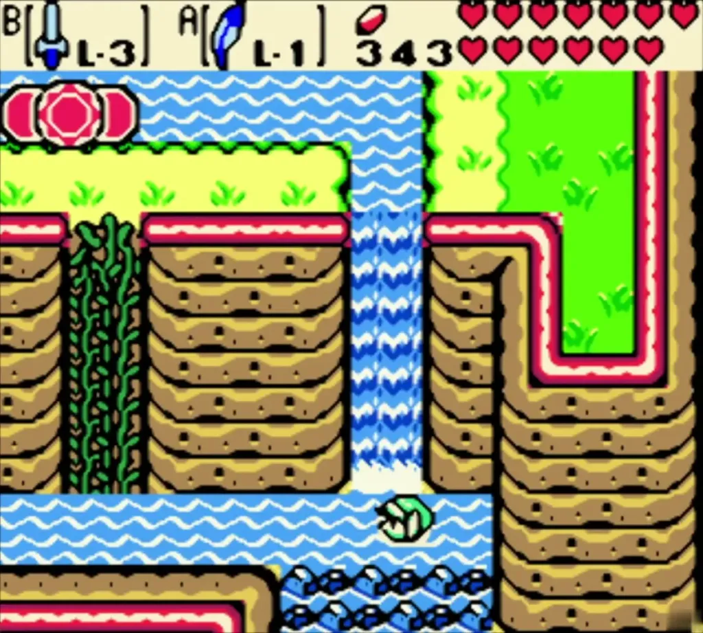 Link at the base of a waterfall beside climbable vines on the Sunken City cliff Link at the base of a waterfall beside climbable vines on the Sunken City cliff