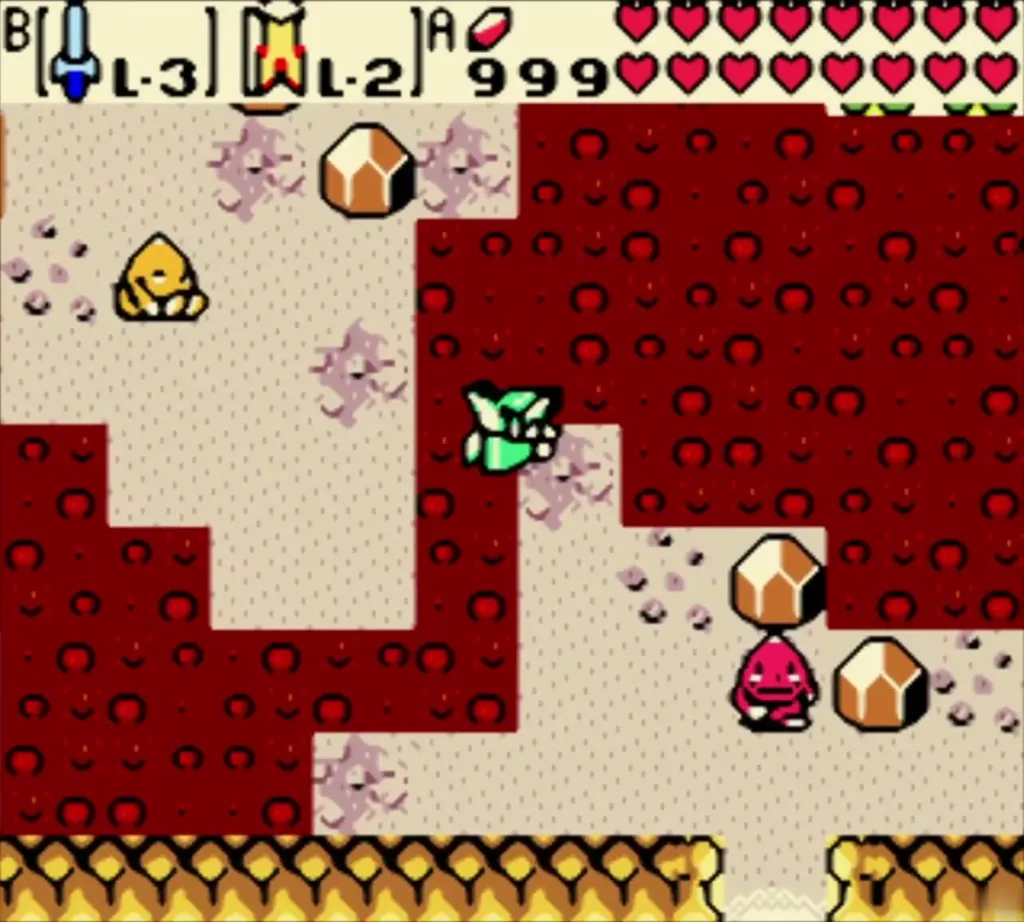 Link in the Goron Mountain caverns with rock enemies and a pink cavern floor Link in the Goron Mountain caverns with rock enemies and a pink cavern floor