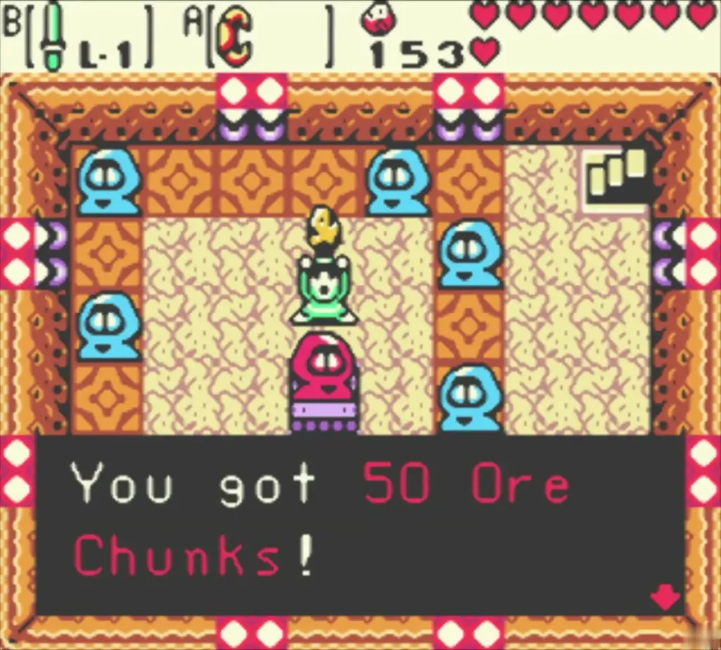 Link holding up 50 Ore Chunks after winning the dance, counter at 153 Link holding up 50 Ore Chunks after winning the dance, counter at 153