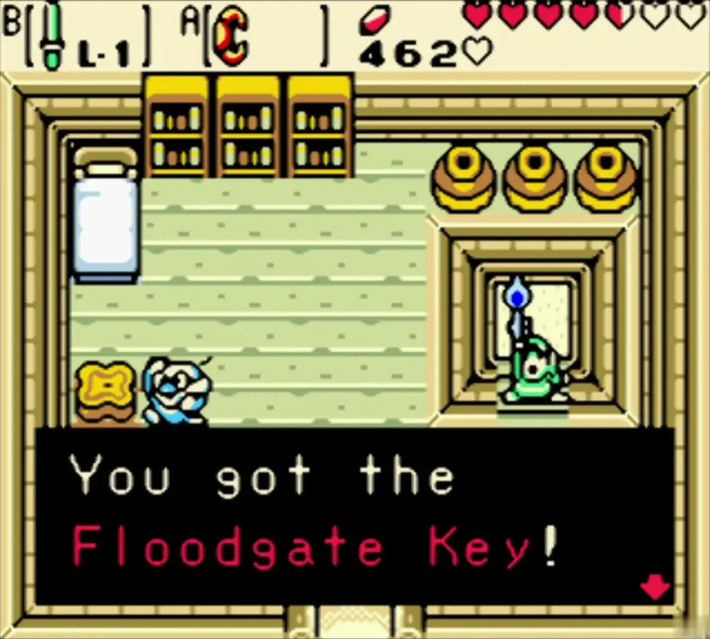 Link holding up the Floodgate Key in the drained pool Link holding up the Floodgate Key in the drained pool