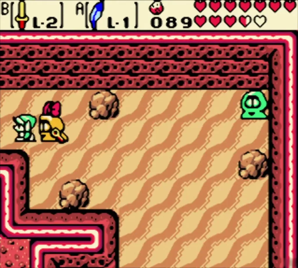 Maple and Link on a sandy Subrosia path with a rock between them