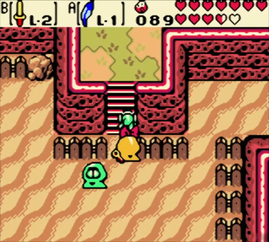 Maple on her broom at the foot of stairs in Subrosia, with Link above her