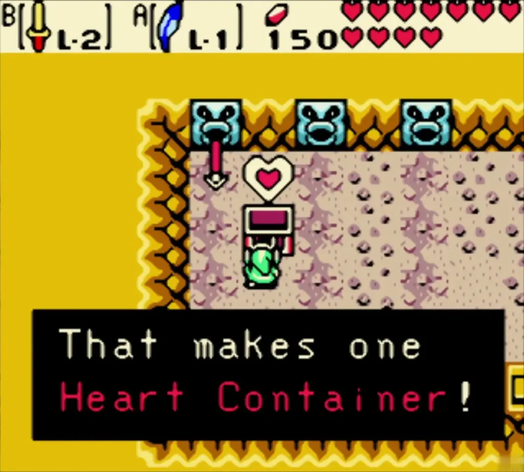 Text box reads That makes one Heart Container in the gold-walled cave Text box reads That makes one Heart Container in the gold-walled cave