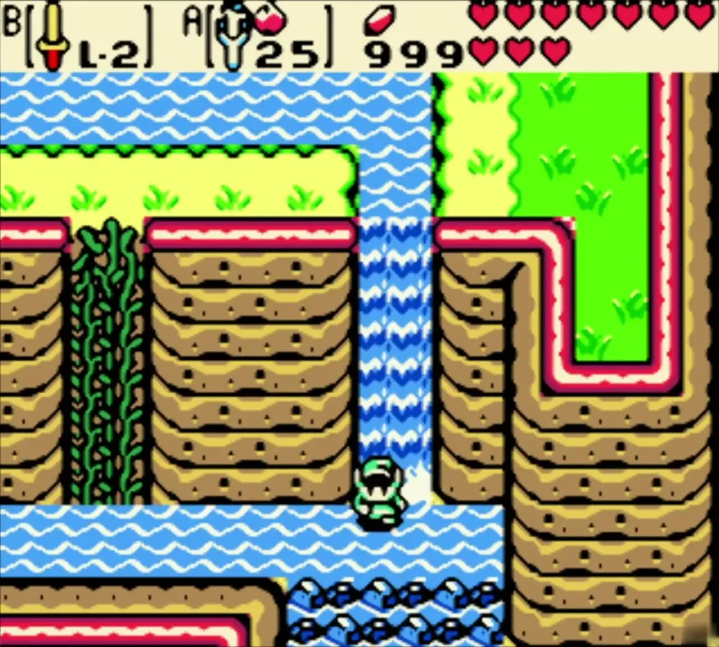 Link in the water at the base of the waterfall beside the cliff Link in the water at the base of the waterfall beside the cliff