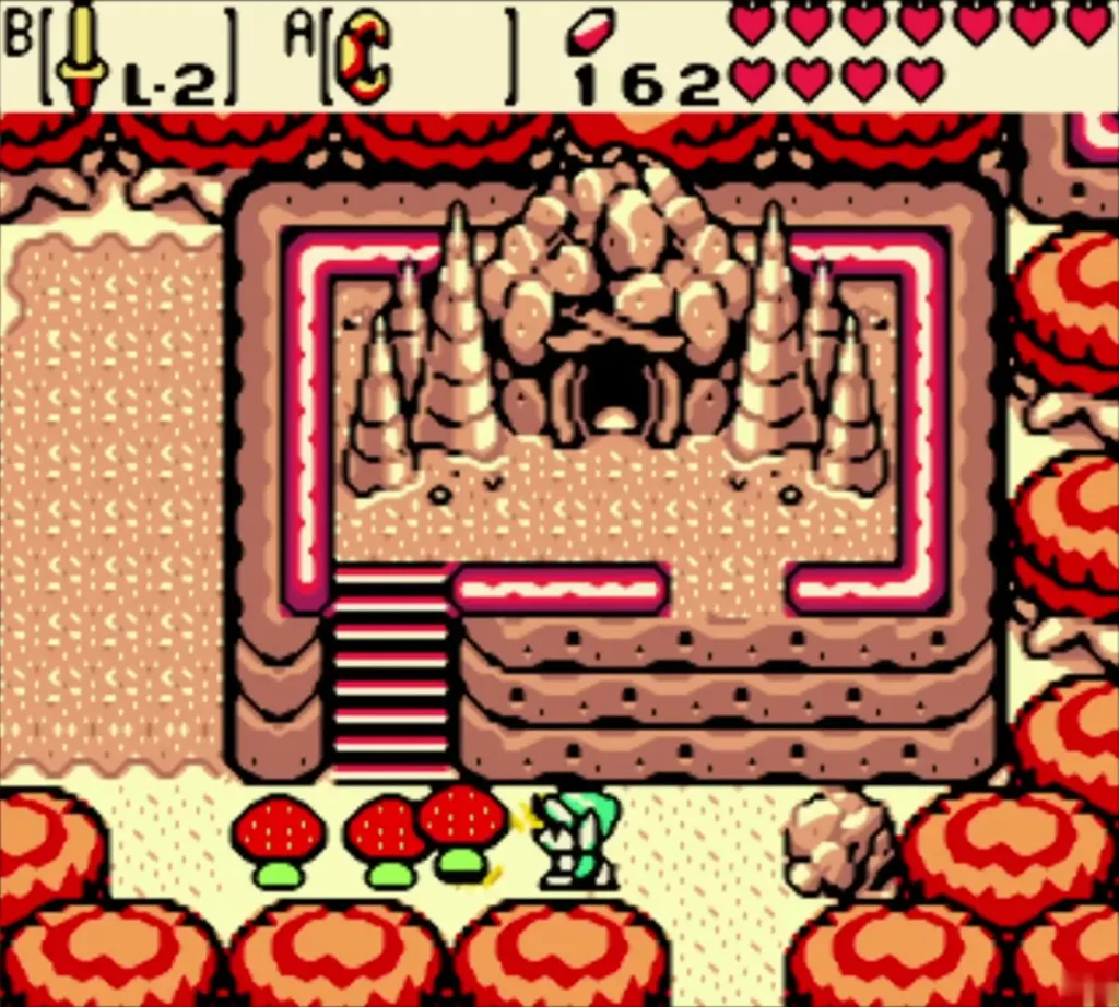 Link beside the autumn cave entrance, red mushrooms at the left Link beside the autumn cave entrance, red mushrooms at the left